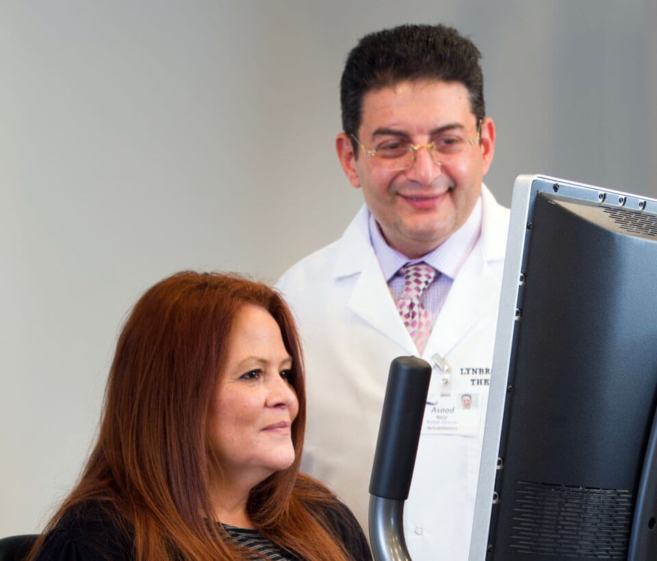 Lynbrook Restorative doctor with patient